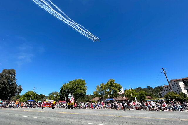 Stunt planes fly over the Scotts Valley Fourth of July parade