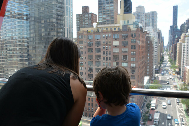 Aunt Bethany and Julian ride the Roosevelt Island Tram