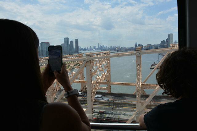 Aunt Bethany and Calvin ride the Roosevelt Island Tram