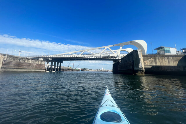 Kayak approaches Johnson Street Bridge