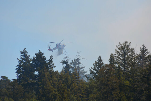 N476DF Calfire Fire Hawk drops water on the DeLaveaga Fire