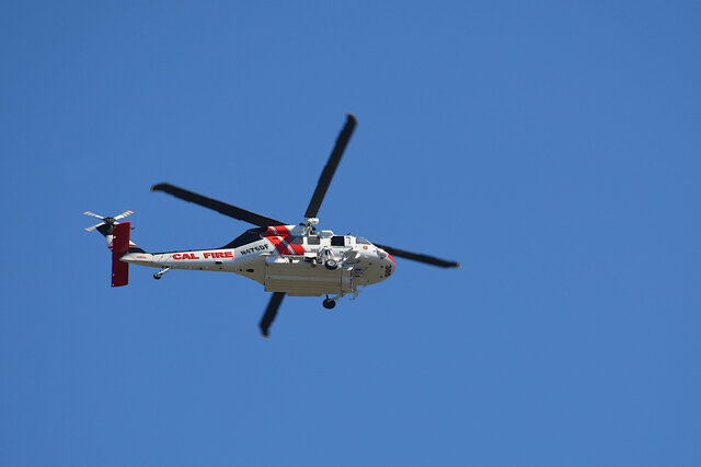 N476DF Calfire Fire Hawk circles the DeLaveaga Fire