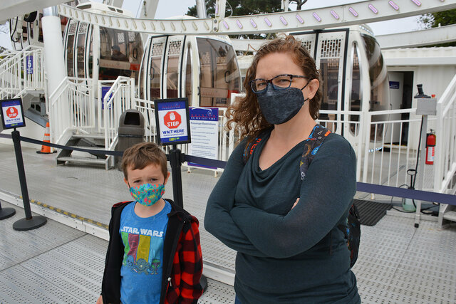 Julian and Kiesa wait for the Skystar Wheel