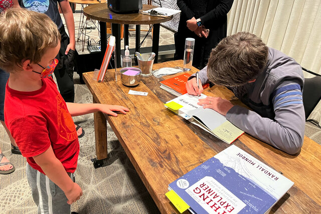 Randall Munroe signs Julian's book