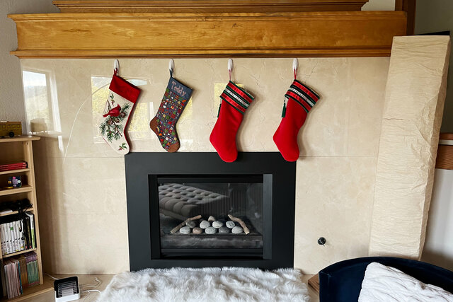 Christmas stockings hung from the mantle