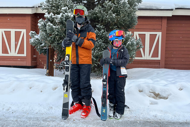 Calvin and Julian with skis