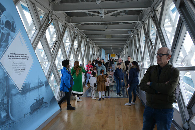 Tourists on the upper span of the Tower Bridge