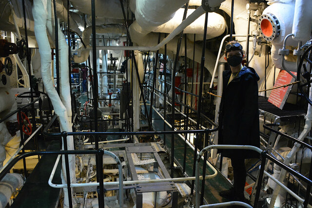 Calvin in the engine room on HMS Belfast