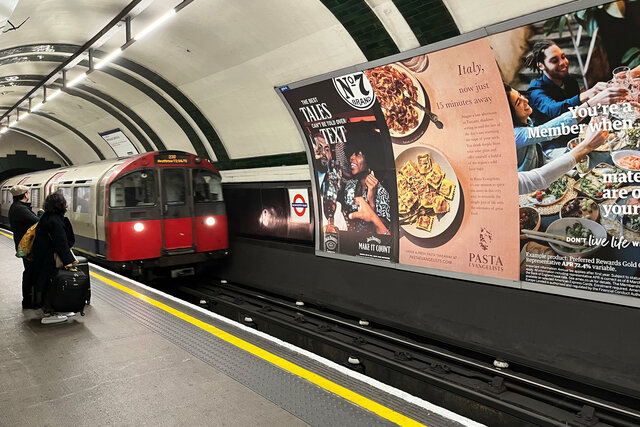 Piccadilly line train pulls into Gloucester Road station