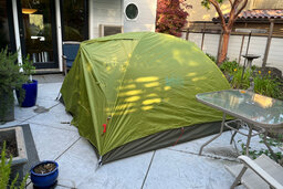 REI Trail Hut 4 Tent set up on the patio