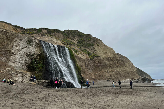 People cluster around Alamere Falls