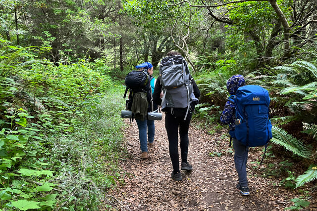 Kiesa, Calvin, and Julian hike down the Glen Loop Trail