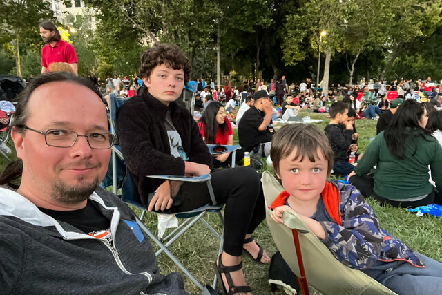 Jaeger, Calvin, and Julian wait for fireworks in San Jose