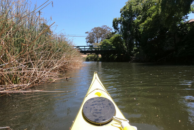 Kayak approaches Highway 1 in Lagunitas Creek