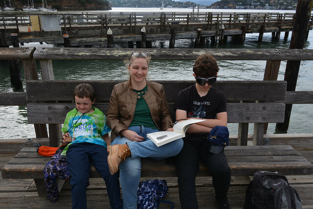 Julian, Kiesa, and Calvin wait for the ferry on Angel Island