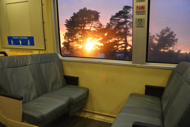 Sun setting outside a BART car