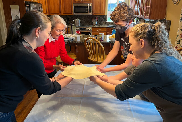 Bethany, Nana, Calvin, Julian, and Kiesa make apple strudel