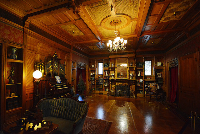 Wood-paneled sitting room in the Winchester Mystery House