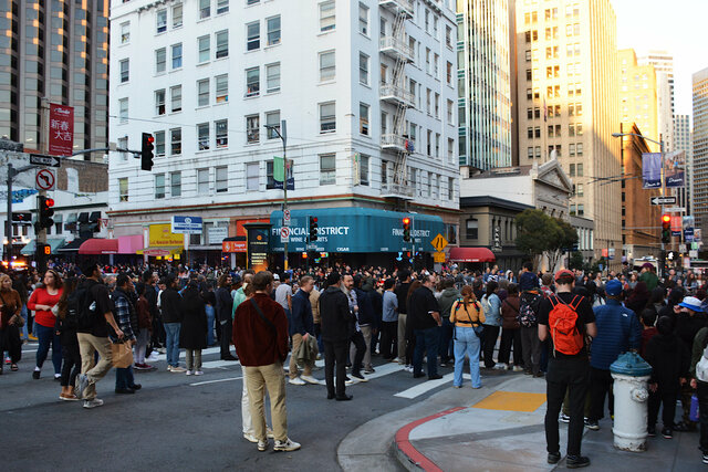 Crowd waits for the Chinese New Year parade on Kearny
