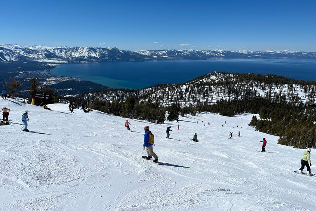 Skiing down California Trail towards Lake Tahoe