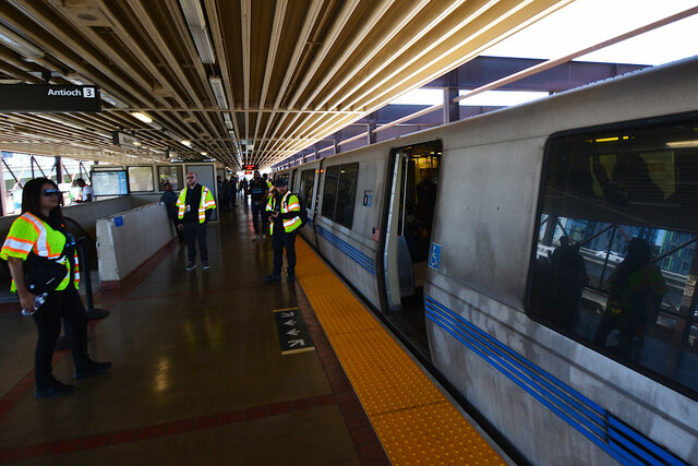 BART legacy train on the platform at MacArthur