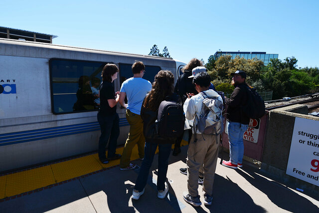 Rail fans with BART legacy car #1203 at Fremont