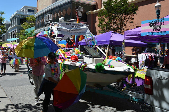 Parade grand marshal in a boat