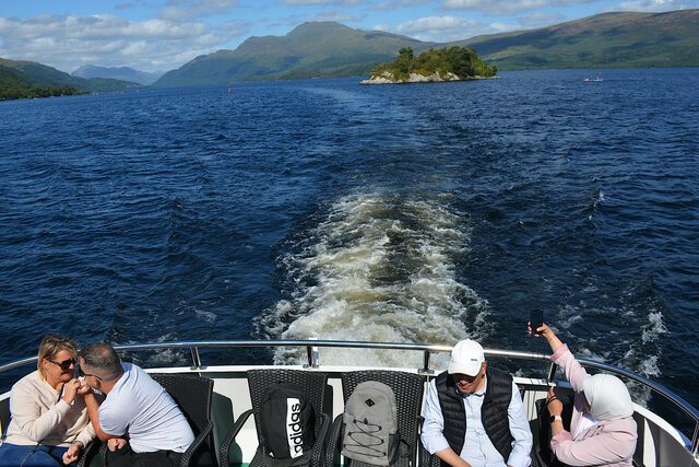 Silver Marlin's wake cruising south on Loch Lomond