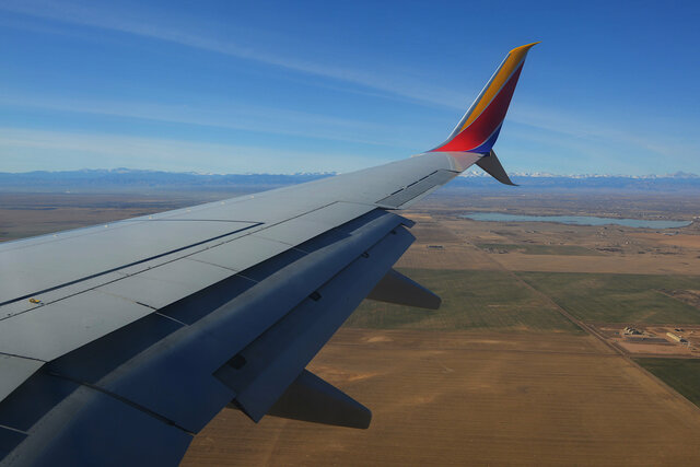 737 wing descending into Denver