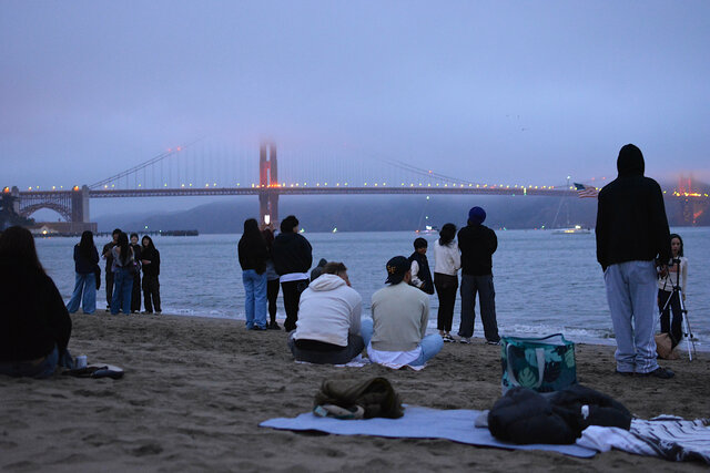 While we waited for fireworks, the lights came on the bridge