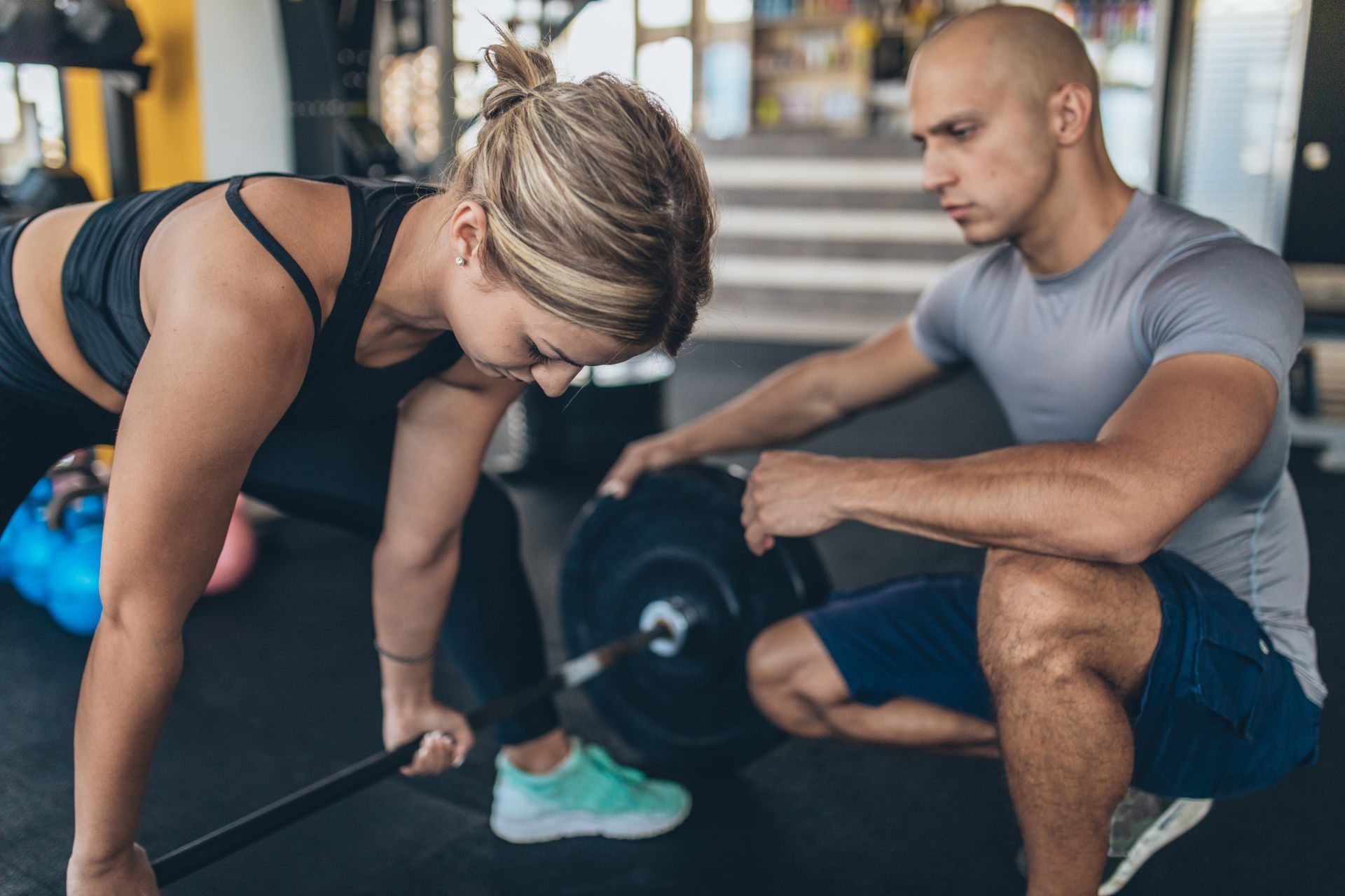 What are some exercises that can be performed on a balance board to improve balance and coordination?