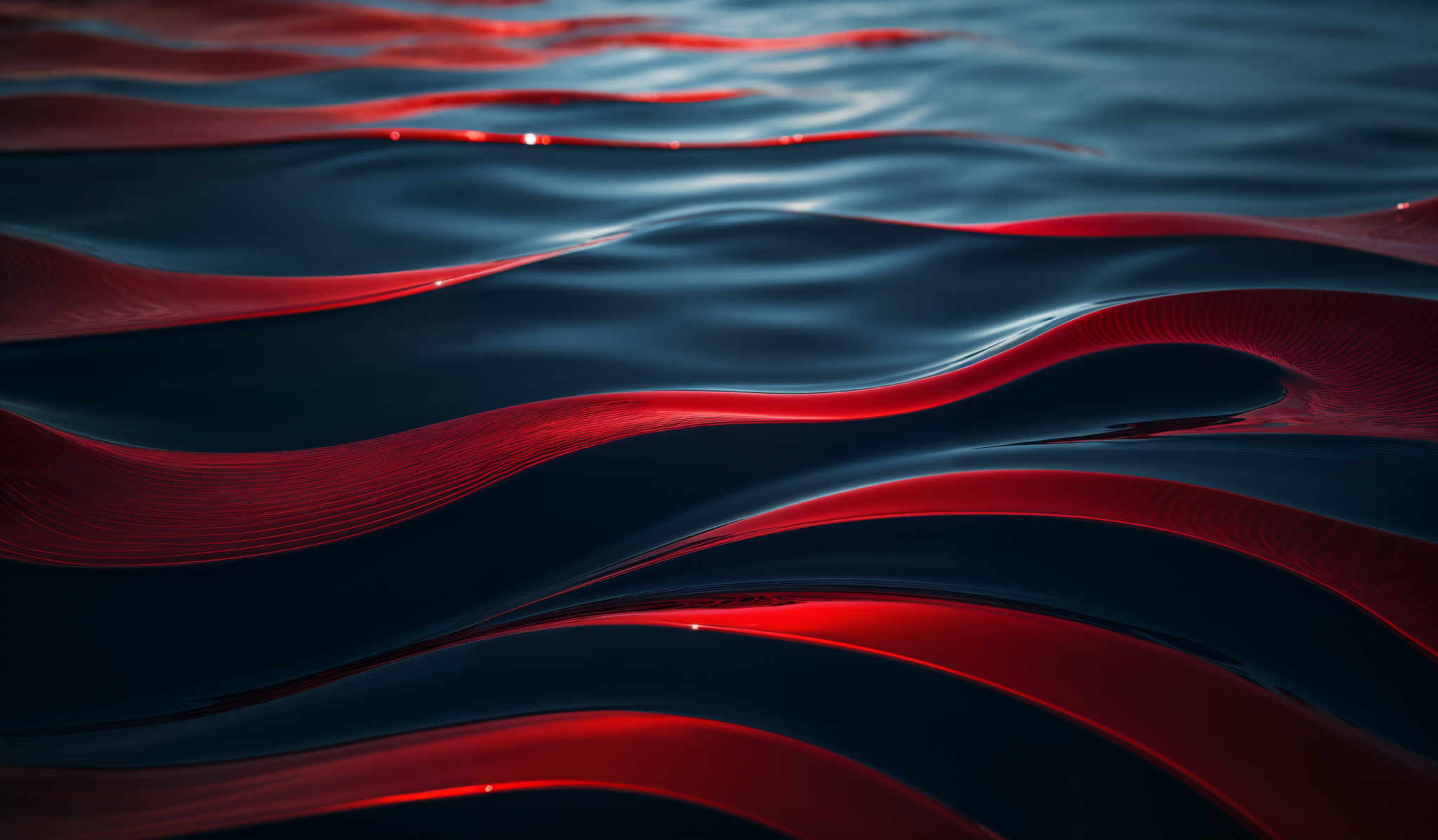 The image showcases a vibrant interplay of colors. Dominating the scene are deep shades of blue and red. The red appears as flowing, wavy patterns that contrast beautifully against the darker blue background. These patterns give the impression of liquid or flowing material, perhaps resembling water or some form of viscous substance. The intricate details and the way the colors intertwine create a mesmerizing visual effect.