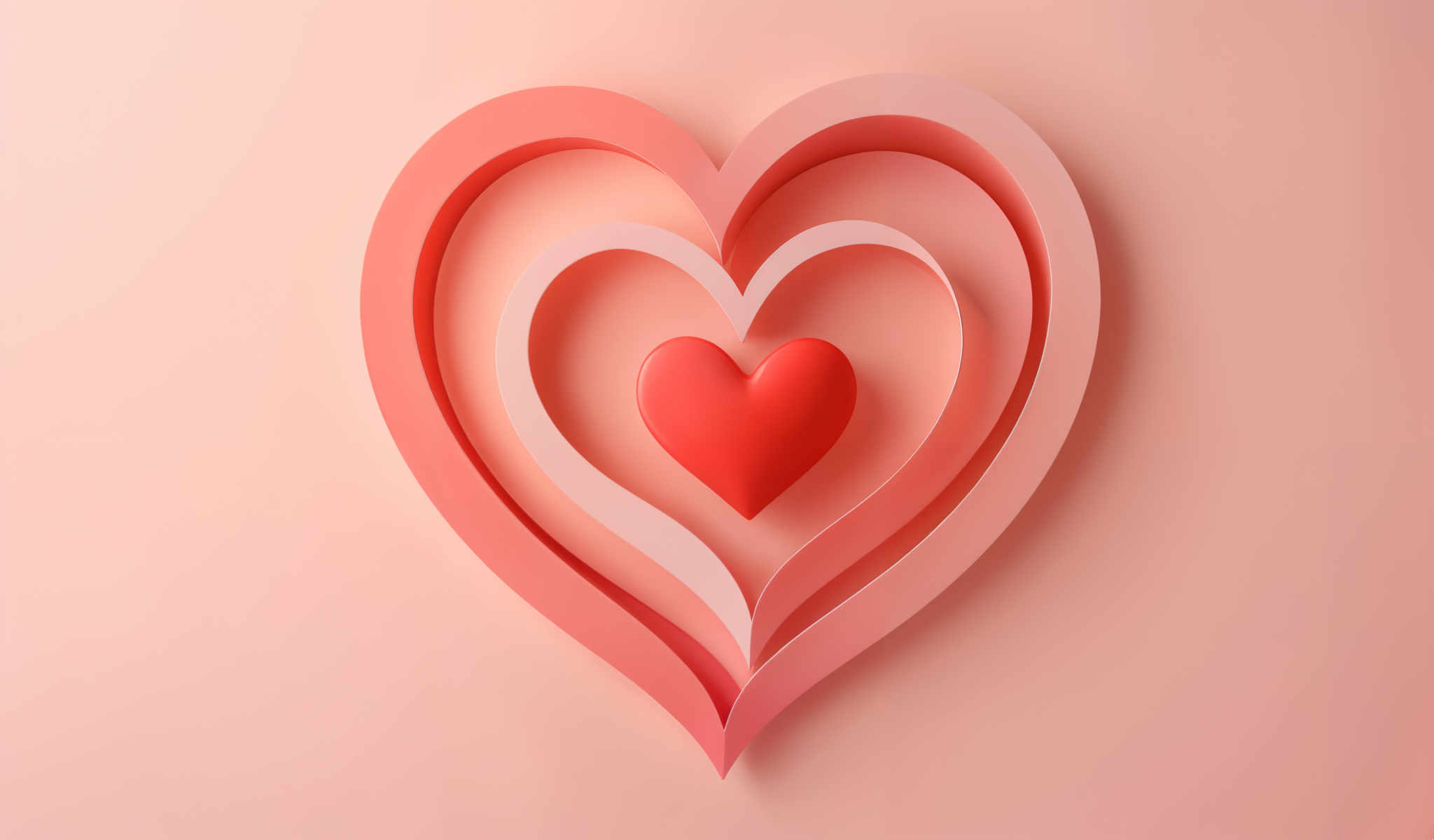 A heart-shaped cutout made of paper in a vibrant shade of pink. The heart is composed of three curved lines that come together to form the shape. The center of the heart is filled with a solid red color creating a striking contrast against the pink. This heart is not alone; it is surrounded by a backdrop of the same pink color which enhances its visibility. The image is a simple yet powerful representation of love and affection.