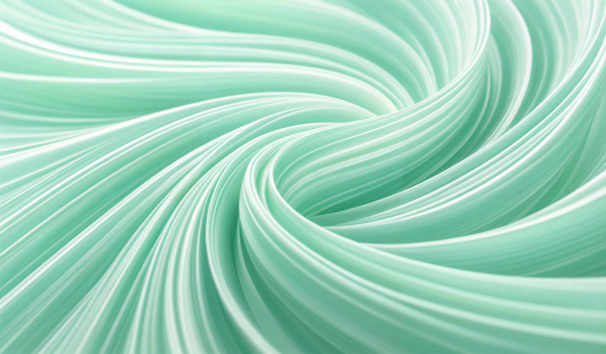 The image showcases a beautifully intricate swirl of teal and turquoise colored lines. These lines are tightly wound around each other, creating a spiral effect. The swirls are smooth and flowing, giving the image a dynamic and fluid appearance. The overall shape is reminiscent of a twisted or wound ribbon or fabric.