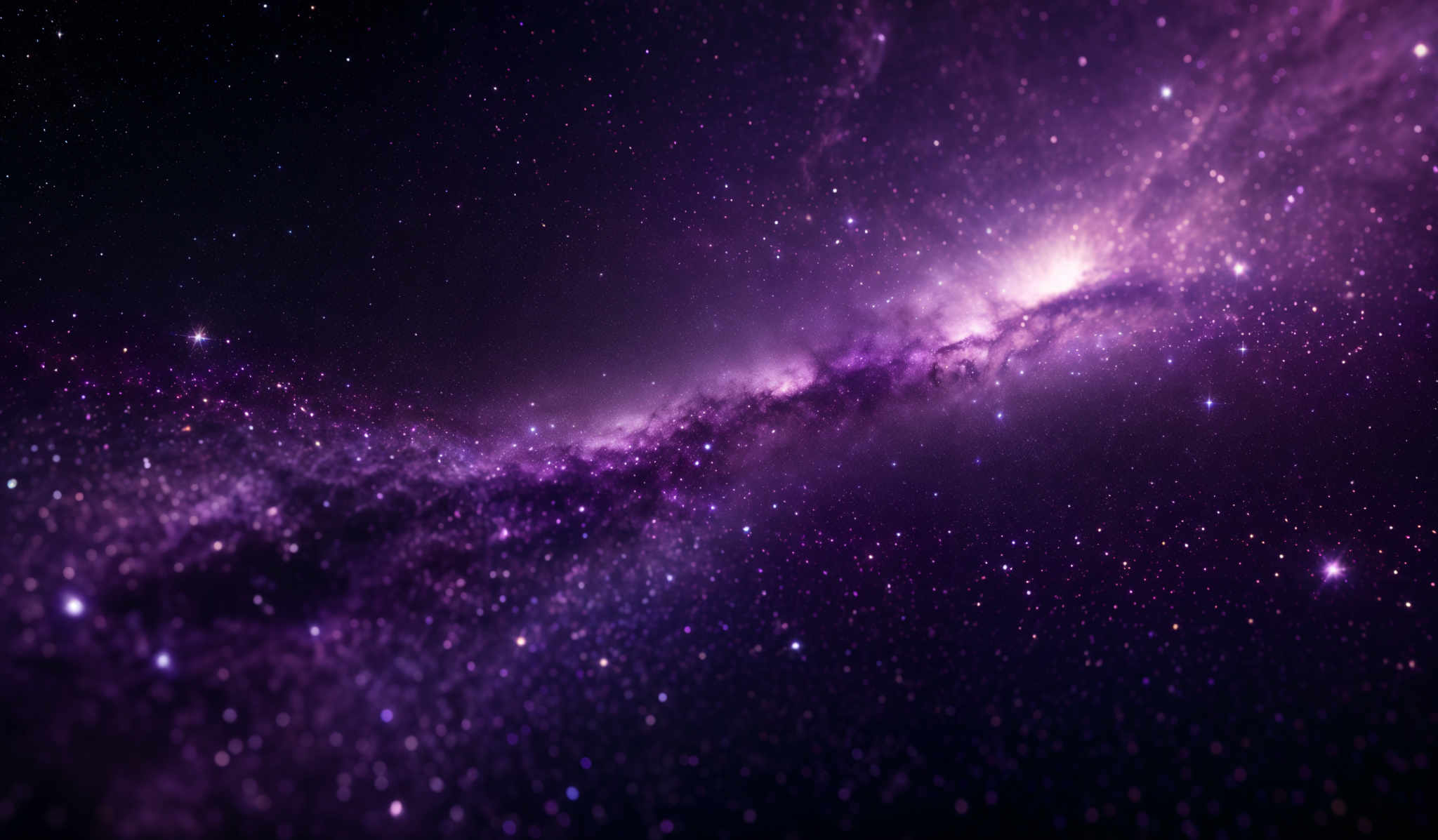 The image showcases a vast expanse of space filled with countless stars. The predominant colors are shades of purple, blue, and black. The stars are scattered throughout, with some appearing as bright dots and others as faint specks. There's a prominent, luminous band that stretches across the image, possibly representing a galaxy or a nebula. The overall shape is reminiscent of a vast cosmic landscape, with the stars and the luminant band creating a sense of depth and vastness.