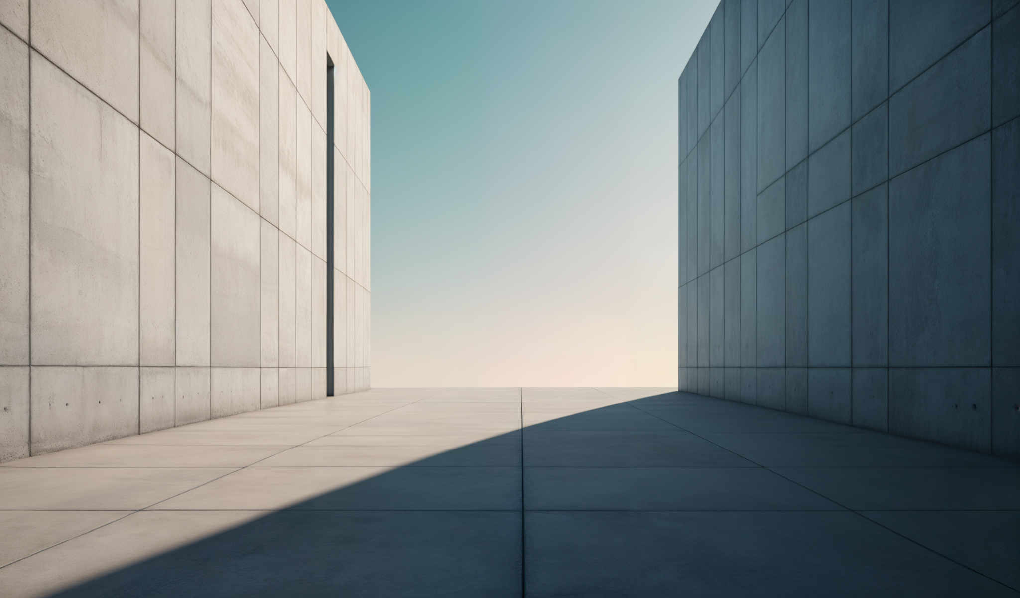 A large concrete structure with a blue sky in the background.