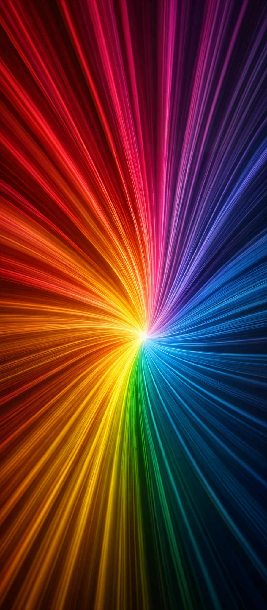 The image showcases a vibrant and dynamic burst of colors radiating outwards from a central point. The colors transition smoothly from red at the outermost edge to blue at the innermost part. The shape resembles a radial or spiral pattern, with the colors emanating outward in a converging manner. The overall effect is reminiscent of a colorful explosion or a radiant burst of energy.