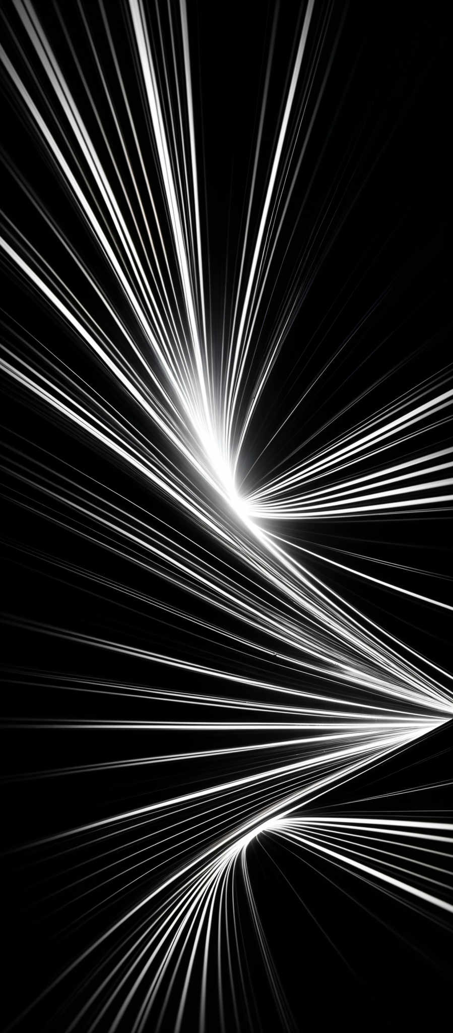 The image showcases a dynamic and abstract pattern. It predominantly features black and white colors. The shape is characterized by converging lines that radiate outward, creating an effect reminiscent of a burst or explosion. The lines are slender and appear to be in motion, giving the image a sense of energy and dynamism.