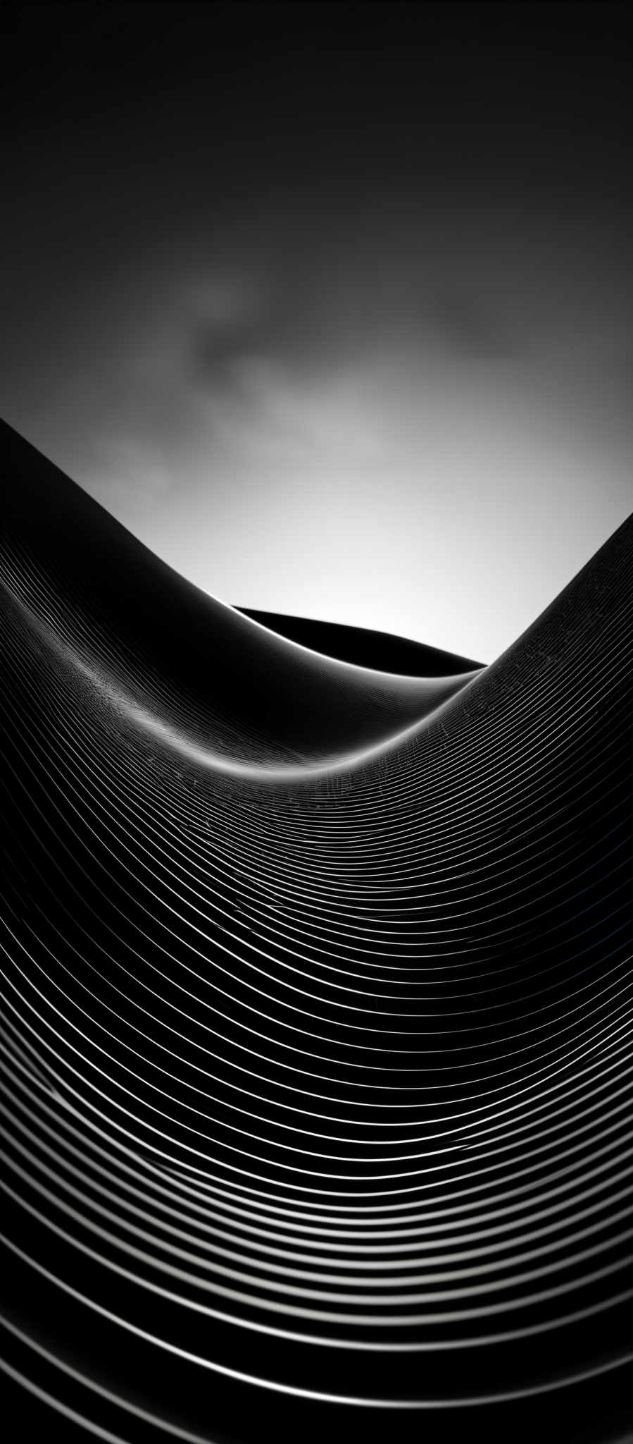 The image showcases a monochromatic, possibly black and white, depiction of a series of undulating, parallel lines. These lines create a rhythmic pattern that appears to be in motion, giving the image a sense of depth and dimension. The shape resembles a series or waves, with the lines converging towards the top, suggesting a horizon or a point of focus. The overall effect is both mesmerizing and abstract, inviting viewers to interpret the image in their own unique way.