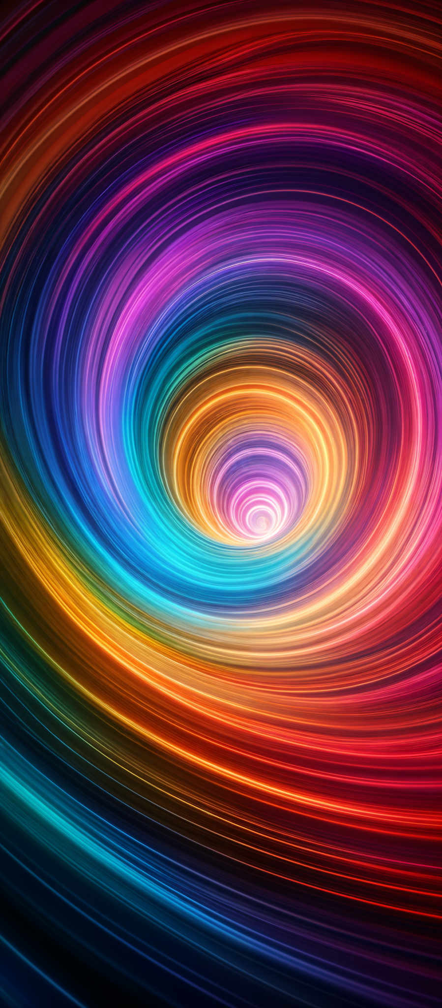 The image showcases a vibrant and mesmerizing swirl of colors. The swirl is centrally focused with a bright white or light center, surrounded by a spiral of colors ranging from deep blues and purples at the top, transitioning to pinks, oranges, and yellows towards the bottom. The colors seem to be emanating from the center, creating a dynamic and hypnotic effect. The shape resembles a whirlpool or a vortex, drawing the viewer's eye towards the center.