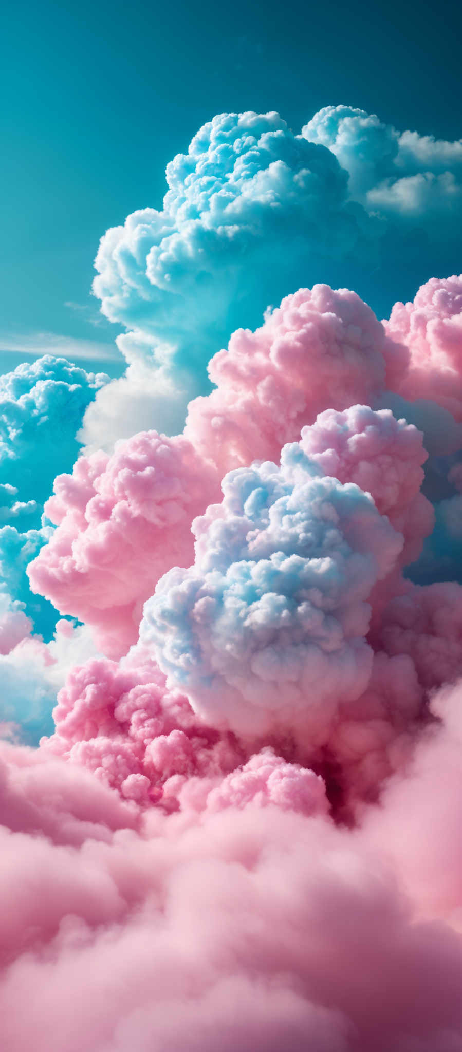 The image showcases a breathtaking view of cumulus clouds. The clouds are depicted in various shades of pink, blue, and white. They are fluffy and voluminous, with some appearing as towering giants while others are more delicate and spread out. The sky behind the clouds is a deep shade of blue, providing a stark contrast to the vibrant colors of the clouds.