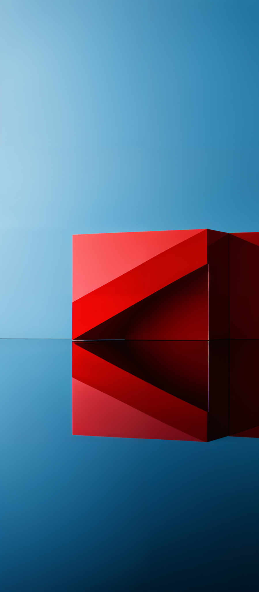 The image showcases a vibrant and minimalist composition. Dominating the scene is a large, rectangular block of red, which is juxtaposed against a serene blue background. This red block is positioned in such a way that it casts a sharp reflection on a mirror-like surface below, creating a symmetrical visual effect. The reflection of the red block in the water is almost perfectly mirrored, adding depth and dimension to the image, and emphasizing the block's geometric precision.