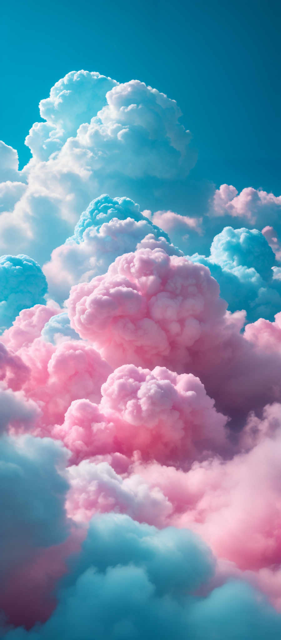 The image showcases a breathtaking view of cumulus clouds. The clouds are predominantly in shades of pink, white, and light blue. They are fluffy and billowing, with some appearing larger and more dense than others. The sky behind the clouds is a deep blue, providing a stark contrast to the vibrant colors of the clouds.