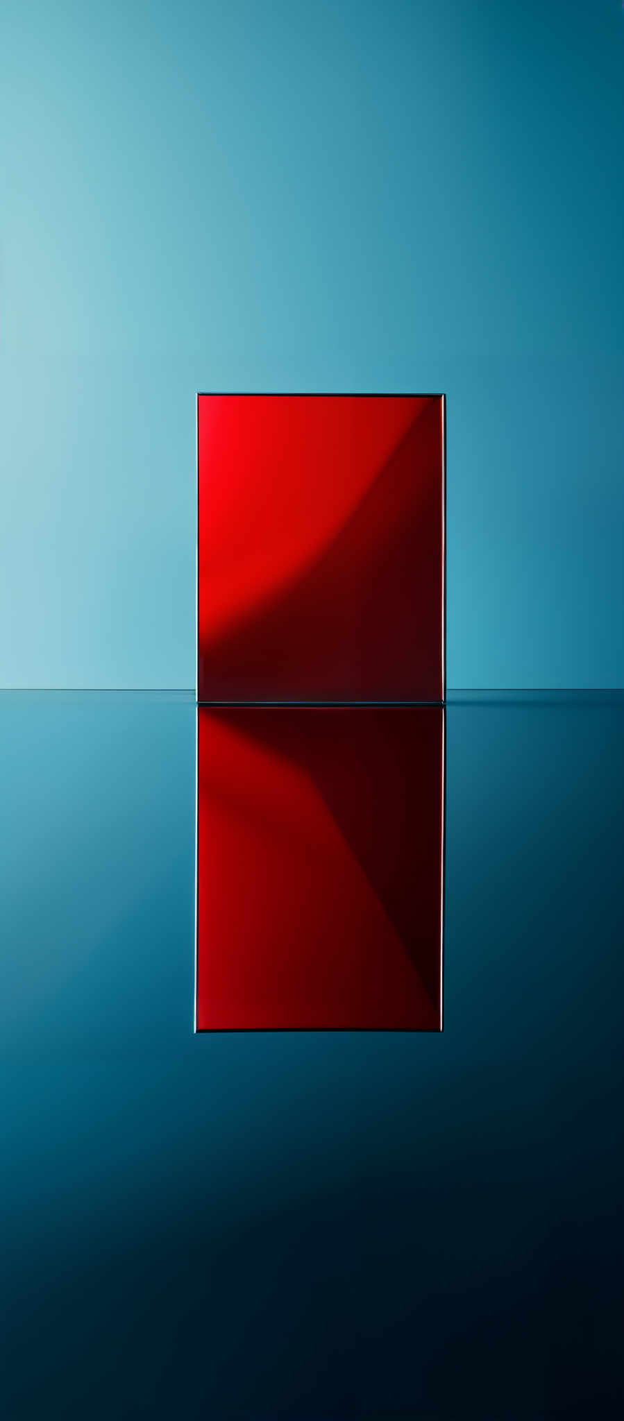 The image showcases a rectangular shape divided into two distinct sections. The top section is a gradient of light blue, transitioning from a lighter hue at the top to a darker shade towards the bottom. The bottom section is of a vibrant red color, which appears to be reflecting on a smooth surface below, creating a mirrored image.