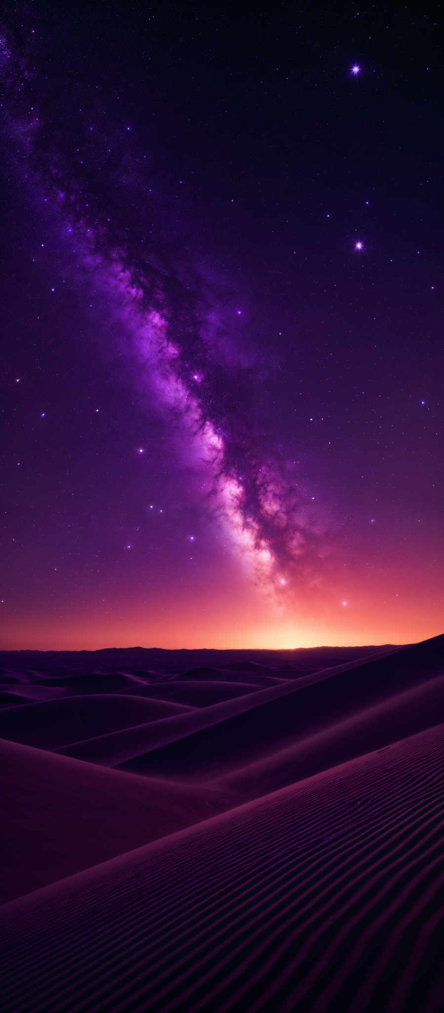 The image showcases a breathtaking view of a desert landscape at night. The foreground features undulating sand dunes with a distinct ripple pattern, suggesting the influence of wind. The middle ground reveals a vast expanse of the desert, leading to a horizon that meets a starry sky. The sky is dominated by the Milky Way galaxy, which stretches across the canvas in a brilliant display of purple, pink, and white hues. The brightest stars and celestial bodies are scattered throughout, adding to the overall beauty and mystique of the scene.