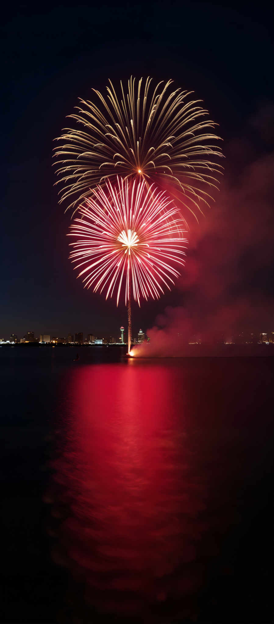 A large explosion of fireworks in the sky.