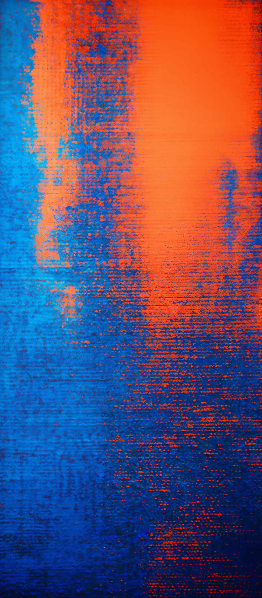 The image showcases a gradient of colors transitioning from a deep blue at the top to a vibrant orange at the bottom. The blue section appears to have a textured, almost brush-stroked pattern, while the orange section has a smoother, more uniform texture. The overall impression is of a blend of two distinct colors, possibly representing a sunset or sunrise over water.