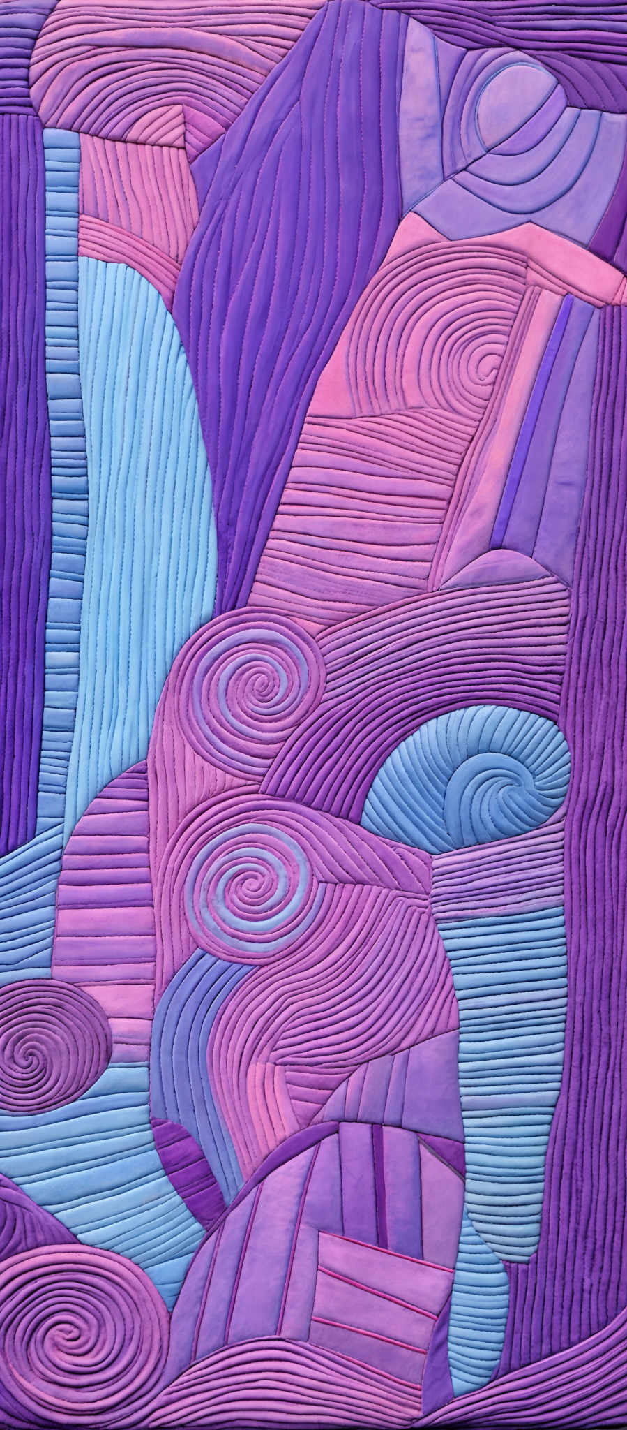 The image showcases a vibrant and intricate design with a predominant use of purples, blues, and pinks. The design features a variety of swirling patterns, rectangles, and wavy lines. The swirls are particularly prominent, with some resembling spirals and others taking on a more abstract form. The rectangles are layered and interspersed throughout the design, adding depth and contrast. The overall feel of the image is both abstract and harmonious, with the colors complementing each other beautifully.