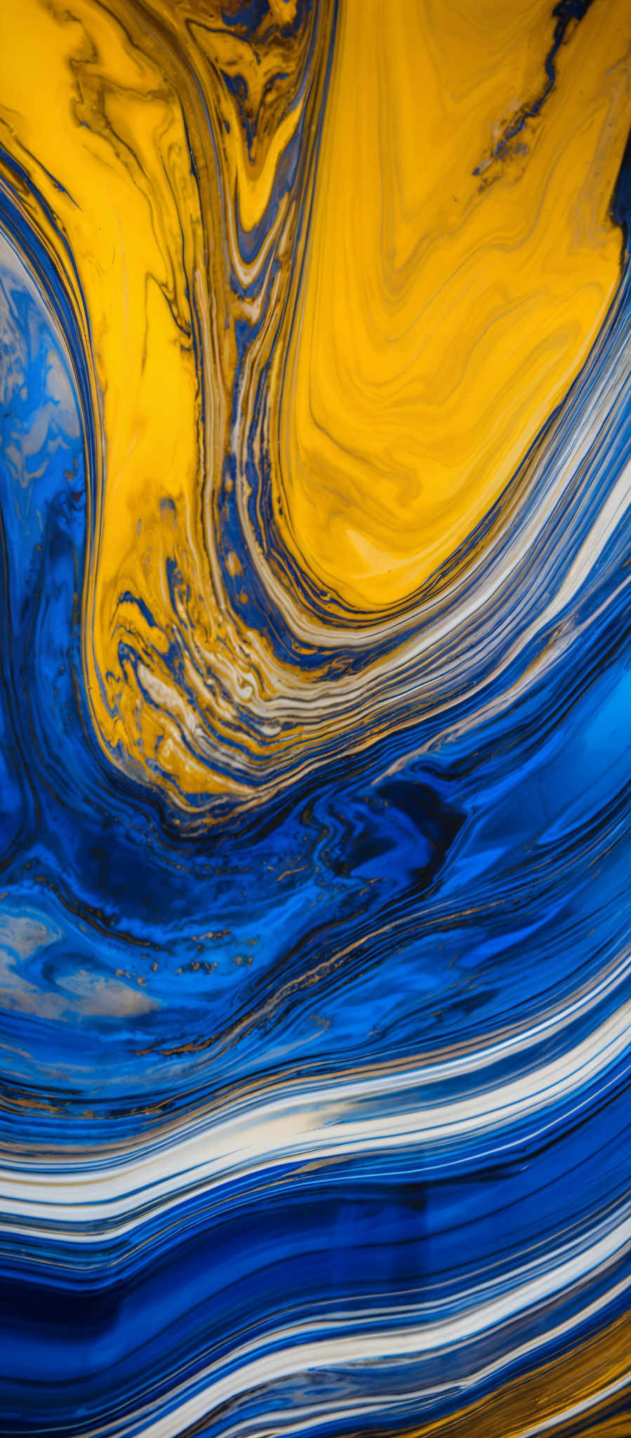 The image showcases a vibrant and intricate interplay of colors. Dominant hues include deep blue, bright yellow, and white. The patterns resemble fluid art, with swirling and layered patterns that give the impression of a mix or blend of different substances, possibly resembling the flow of water or paint. The shapes are organic and fluid, with no distinct boundaries, creating a sense of movement and dynamism.