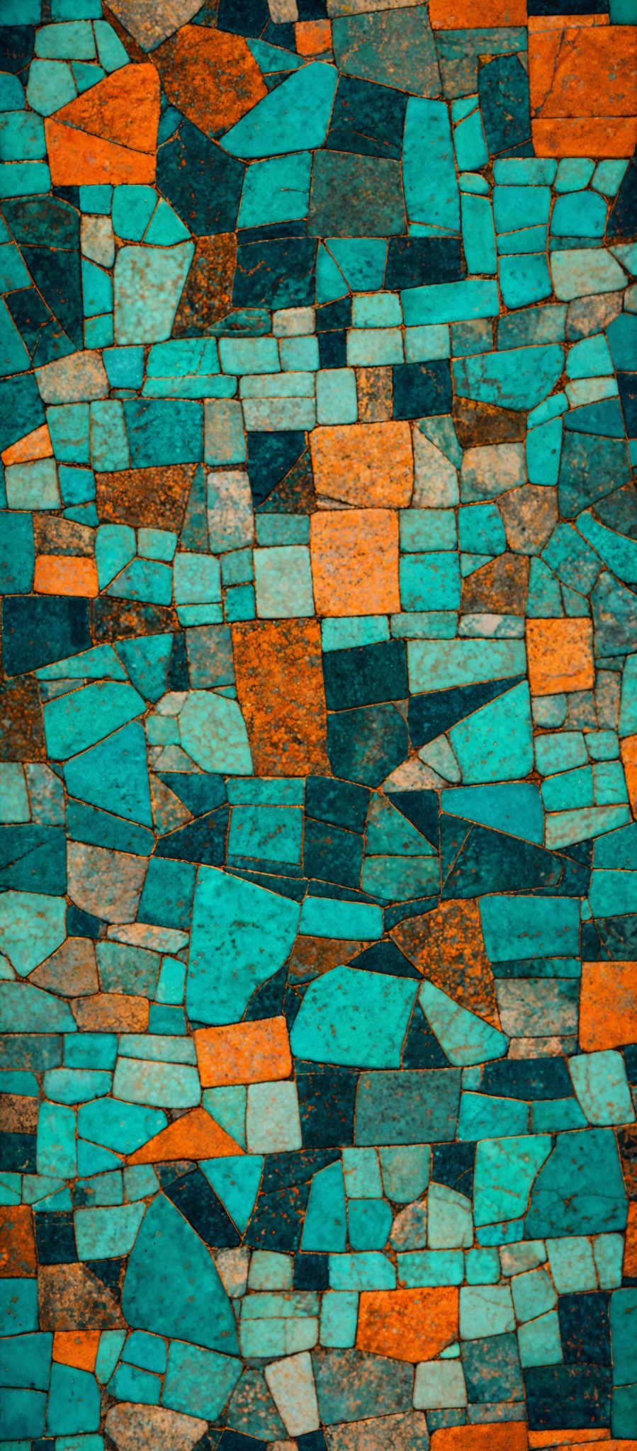 The image showcases a mosaic of irregularly shaped tiles arranged in a pattern. The tiles come in a variety of colors including shades of blue, orange, and gray. The pattern appears to be random, with no discernible order, giving it a chaotic yet aesthetically pleasing appearance.